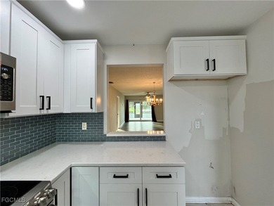 **WOW! A CORNER LOT*DBL GARAGE* AND AN EXTRA 2 SPACE PARKING on Cypress Lake Country Club in Florida - for sale on GolfHomes.com, golf home, golf lot