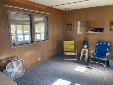 If you are looking for a lovely view, this mobile home with on Bear Creek Lodge Golf Course in New York - for sale on GolfHomes.com, golf home, golf lot