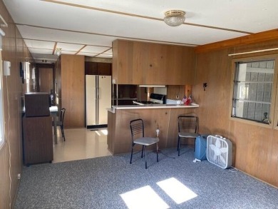 If you are looking for a lovely view, this mobile home with on Bear Creek Lodge Golf Course in New York - for sale on GolfHomes.com, golf home, golf lot