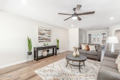 STUNNING REMODEL featuring RAISED CEILINGS, luxury wood-look on Sun Lakes Country Club in Arizona - for sale on GolfHomes.com, golf home, golf lot