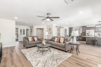 STUNNING REMODEL featuring RAISED CEILINGS, luxury wood-look on Sun Lakes Country Club in Arizona - for sale on GolfHomes.com, golf home, golf lot