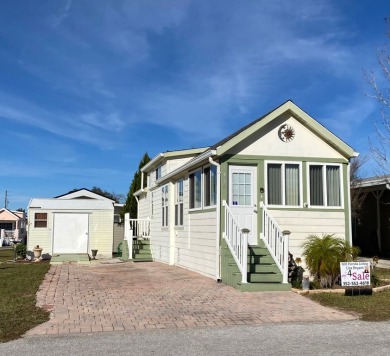 This cute little park model is waiting for its next residents on Clerbrook Resort, Inc. in Florida - for sale on GolfHomes.com, golf home, golf lot