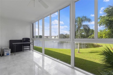 Spacious 2/2 corner unit on the second floor with a serene on Wynmoor Golf Course in Florida - for sale on GolfHomes.com, golf home, golf lot