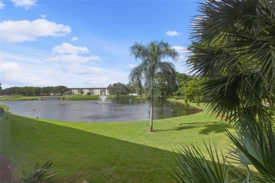 Spacious 2/2 corner unit on the second floor with a serene on Wynmoor Golf Course in Florida - for sale on GolfHomes.com, golf home, golf lot