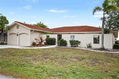 PRIME WATERFRONT LOCATION IN PUNTA GORDA ISLES! An AMAZING PRICE on Saint Andrews South Golf Club in Florida - for sale on GolfHomes.com, golf home, golf lot