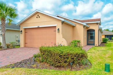 Charming 2 bedroom, 2 bath home with a study is nestled in the on Stonegate Golf Club in Florida - for sale on GolfHomes.com, golf home, golf lot