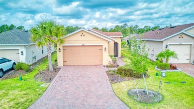 Charming 2 bedroom, 2 bath home with a study is nestled in the on Stonegate Golf Club in Florida - for sale on GolfHomes.com, golf home, golf lot