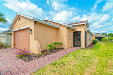 Charming 2 bedroom, 2 bath home with a study is nestled in the on Stonegate Golf Club in Florida - for sale on GolfHomes.com, golf home, golf lot