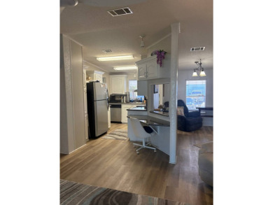 Come and see this richly decorated home. Located in The Heritage on Sabal Springs Golf and Racquet Club in Florida - for sale on GolfHomes.com, golf home, golf lot