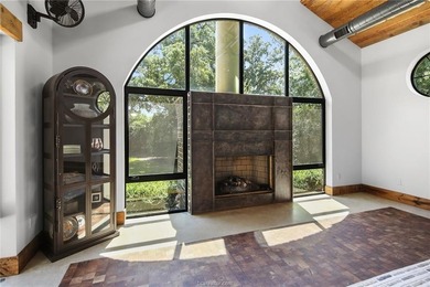 Experience luxury redefined in this private 6,021 SqFt custom on The Traditions Club At Texas A and M in Texas - for sale on GolfHomes.com, golf home, golf lot