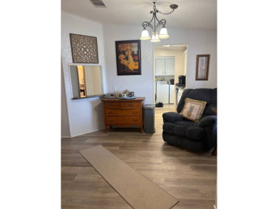 Come and see this richly decorated home. Located in The Heritage on Sabal Springs Golf and Racquet Club in Florida - for sale on GolfHomes.com, golf home, golf lot