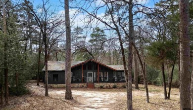 This charming 3-bedroom, 2-bathroom, 1600 sf house is nestled in on Holly Lake Ranch Golf Club in Texas - for sale on GolfHomes.com, golf home, golf lot