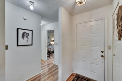 Well-maintained two bedroom, two bath open floor plan Idlewood on Falcon Watch Golf Club in Florida - for sale on GolfHomes.com, golf home, golf lot