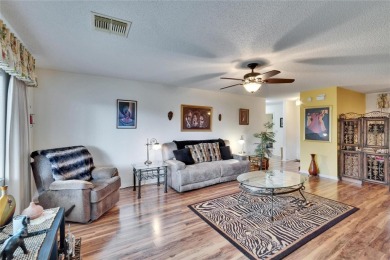 Well-maintained two bedroom, two bath open floor plan Idlewood on Falcon Watch Golf Club in Florida - for sale on GolfHomes.com, golf home, golf lot