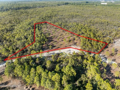 Price improvement! Welcome to an extraordinary 1.11-acre on Members Club At St. James Plantation in North Carolina - for sale on GolfHomes.com, golf home, golf lot