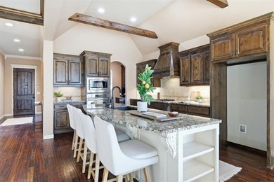 Stunning home backing to a private wooded preserve with on White Hawk Golf Club in Oklahoma - for sale on GolfHomes.com, golf home, golf lot