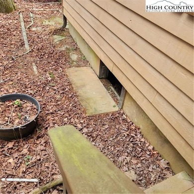 Great opportunity for renovation!  This 1 bedroom 1 bath cabin on Land Harbor Golf Course in North Carolina - for sale on GolfHomes.com, golf home, golf lot