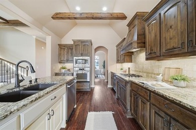 Stunning home backing to a private wooded preserve with on White Hawk Golf Club in Oklahoma - for sale on GolfHomes.com, golf home, golf lot