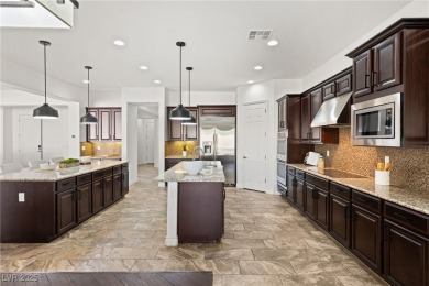 INCREDIBLE SINGLE STORY SECURED BEHIND DOUBLE GATES IS SOUTHERN on Southern Highlands Golf Club in Nevada - for sale on GolfHomes.com, golf home, golf lot