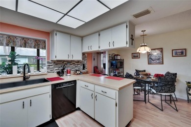 Well-maintained two bedroom, two bath open floor plan Idlewood on Falcon Watch Golf Club in Florida - for sale on GolfHomes.com, golf home, golf lot