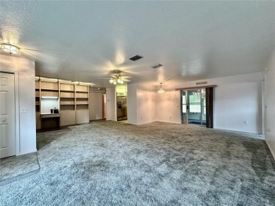 This 3-bedroom, 2-bath block home in Citrus Springs is exactly on Citrus Springs Country Club in Florida - for sale on GolfHomes.com, golf home, golf lot