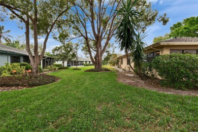 Well-maintained FURNISHED two bedroom, two bath open floor plan on Falcon Watch Golf Club in Florida - for sale on GolfHomes.com, golf home, golf lot