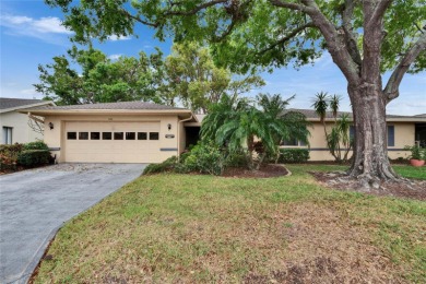 Well-maintained FURNISHED two bedroom, two bath open floor plan on Falcon Watch Golf Club in Florida - for sale on GolfHomes.com, golf home, golf lot