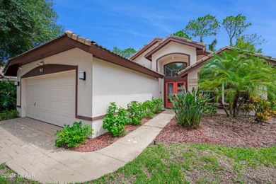 Make this beautifully updated home your new address in gated on Plantation Bay Golf and Country Club in Florida - for sale on GolfHomes.com, golf home, golf lot