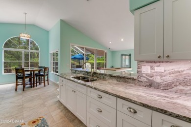 Make this beautifully updated home your new address in gated on Plantation Bay Golf and Country Club in Florida - for sale on GolfHomes.com, golf home, golf lot