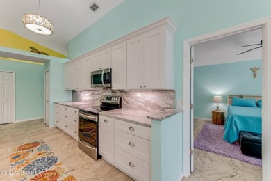 Make this beautifully updated home your new address in gated on Plantation Bay Golf and Country Club in Florida - for sale on GolfHomes.com, golf home, golf lot