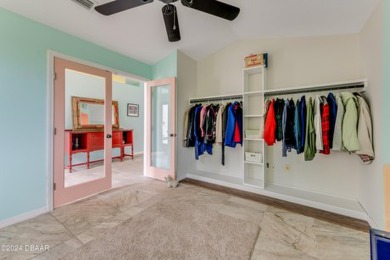 Make this beautifully updated home your new address in gated on Plantation Bay Golf and Country Club in Florida - for sale on GolfHomes.com, golf home, golf lot