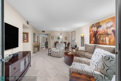 Fully furnished TURNKEY unit with full sized washer and dryer on Wynmoor Golf Course in Florida - for sale on GolfHomes.com, golf home, golf lot