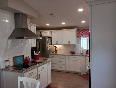 The Lot Rent for this home is $1,342.00/monthly.  Priced to sell on Del Tura Golf and Country Club in Florida - for sale on GolfHomes.com, golf home, golf lot