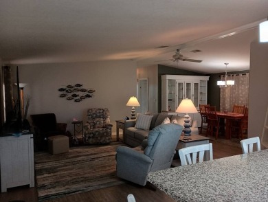 The Lot Rent for this home is $1,342.00/monthly.  Priced to sell on Del Tura Golf and Country Club in Florida - for sale on GolfHomes.com, golf home, golf lot