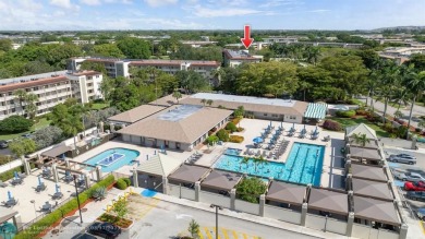 Fully furnished TURNKEY unit with full sized washer and dryer on Wynmoor Golf Course in Florida - for sale on GolfHomes.com, golf home, golf lot
