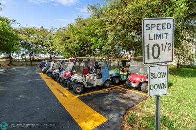 Fully furnished TURNKEY unit with full sized washer and dryer on Wynmoor Golf Course in Florida - for sale on GolfHomes.com, golf home, golf lot