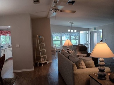 The Lot Rent for this home is $1,342.00/monthly.  Priced to sell on Del Tura Golf and Country Club in Florida - for sale on GolfHomes.com, golf home, golf lot