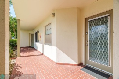 Fully furnished TURNKEY unit with full sized washer and dryer on Wynmoor Golf Course in Florida - for sale on GolfHomes.com, golf home, golf lot