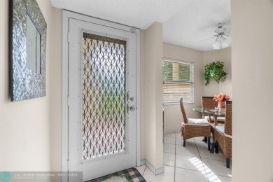 Fully furnished TURNKEY unit with full sized washer and dryer on Wynmoor Golf Course in Florida - for sale on GolfHomes.com, golf home, golf lot