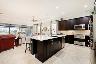 Nestled within the intimate Carena neighborhood of Pelican on Pelican Preserve Golf Club in Florida - for sale on GolfHomes.com, golf home, golf lot