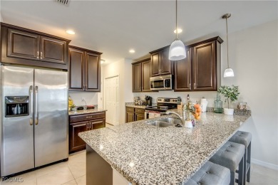 Only SEASONALLY OCCUPIED and never rented, this ONE-OWNER on Gateway Golf and Country Club in Florida - for sale on GolfHomes.com, golf home, golf lot