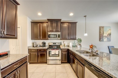 Only SEASONALLY OCCUPIED and never rented, this ONE-OWNER on Gateway Golf and Country Club in Florida - for sale on GolfHomes.com, golf home, golf lot