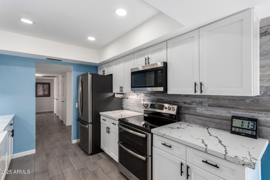 Welcome home to this beautifully remodeled 2-bedroom residence on Union Hills Country Club in Arizona - for sale on GolfHomes.com, golf home, golf lot