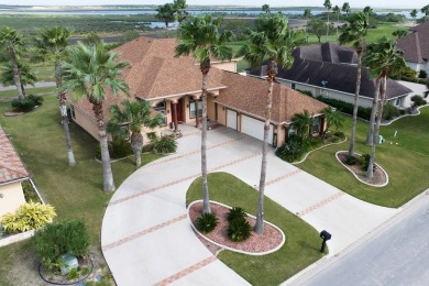 A beautiful home located on the most sought-after street in the on South Padre Island Golf Club in Texas - for sale on GolfHomes.com, golf home, golf lot