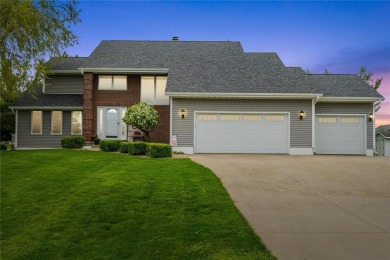 This stunning 4-bedroom, 2.5-bath home sits on a rare double lot on Hunters Ridge Golf Course in Iowa - for sale on GolfHomes.com, golf home, golf lot