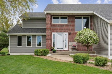 This stunning 4-bedroom, 2.5-bath home sits on a rare double lot on Hunters Ridge Golf Course in Iowa - for sale on GolfHomes.com, golf home, golf lot