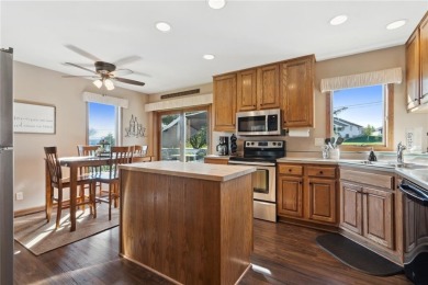 This stunning 4-bedroom, 2.5-bath home sits on a rare double lot on Hunters Ridge Golf Course in Iowa - for sale on GolfHomes.com, golf home, golf lot