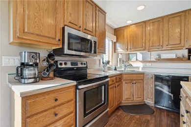 This stunning 4-bedroom, 2.5-bath home sits on a rare double lot on Hunters Ridge Golf Course in Iowa - for sale on GolfHomes.com, golf home, golf lot