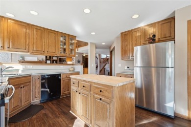 This stunning 4-bedroom, 2.5-bath home sits on a rare double lot on Hunters Ridge Golf Course in Iowa - for sale on GolfHomes.com, golf home, golf lot