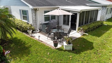 Under contract-accepting backup offers. 2 Bedroom, 2 Bath, 2 Car on Highland Lakes Executive Golf Course in Florida - for sale on GolfHomes.com, golf home, golf lot